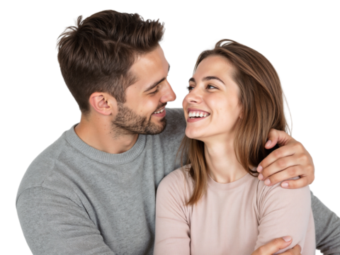 Smiling couple sharing a joyful moment together in a cozy indoor setting during daylight hours