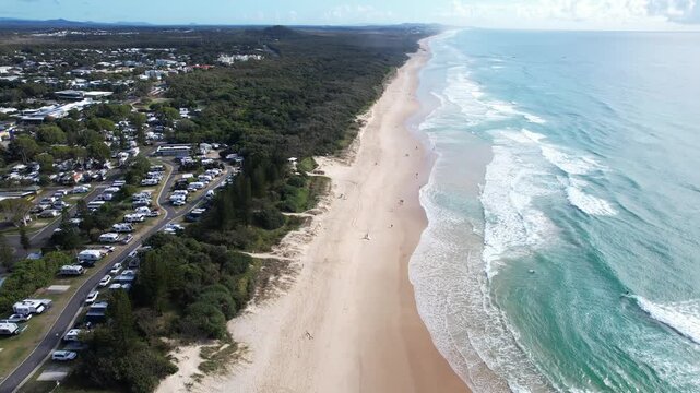 Caravan Park At Coolum Beach By The Blue Sea In Queensland, Australia. - aerial shot
