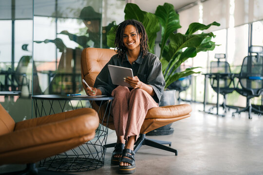 Successful happy african american business woman, startup coworker or software programmer engineer