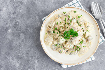Creamy Chicken Stroganoff served in a white bowl