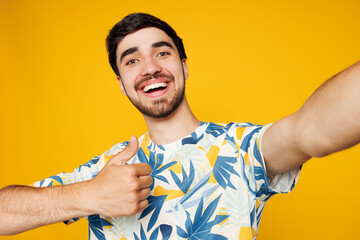 Close up young Caucasian man he wears blue beach t-shirt casual clothes doing selfie shot pov on...