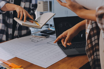 Construction and structure concept of engineer working drawing on blueprint meeting for project...