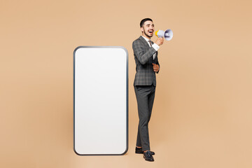 Full body young employee business man corporate lawyer in classic formal grey suit shirt work in...