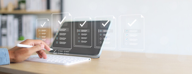 Businessman showing online document validation icon, quality assessment management With a checklist, business document evaluation process, market data report analysis and consulting.