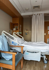 Hospital room for patients. Medical bed ,functional bed for bedridden patients. Medical equipment.