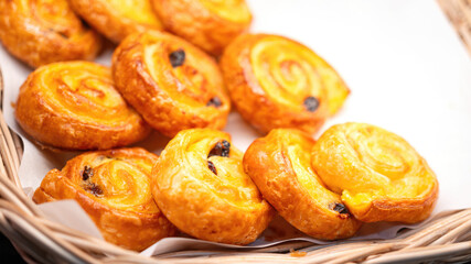 Baked homemade bakery, Danish or tart pie are served in plate at morning breakfast buffet. Close-up and selective focus at the center part, Bakery food photo.