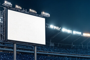 Blank LED stadium screen at night with lights and crowd