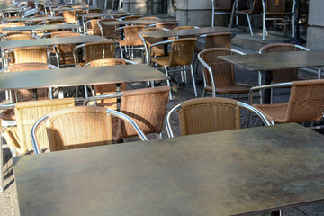 Summer cafe on the street. closed cafe in the morning in a european city.