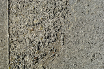texture of an old stone wall. Gray stucco background of the facade. cement plaster walls.