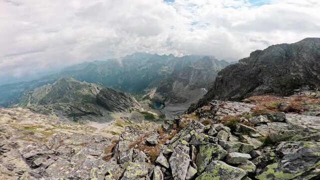 Ultrawide view, top of mountain, majestic views of mountain lakes, nature background of a Tatra National Park, rocky terrain valley, ugc landscape view, stone mountains, calm.
