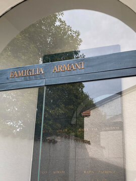 Elegant Armani family tomb nestled among verdant landscape, marking eternal resting place for Giorgio and lineage in Rivalta di Gazzola, Italy