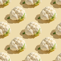 Seamless pattern with Cauliflower on beige background.
