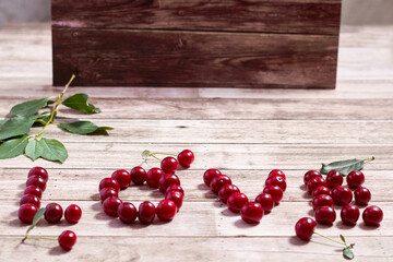 The word love is written in cherry