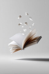 펼쳐진 책과 낙엽 연출