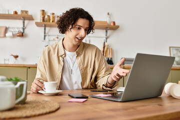 Young professional engaging in a video call while enjoying coffee in a stylish workspace