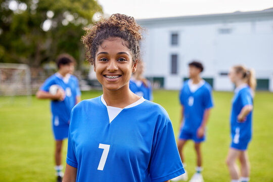 Portrait of african girl athlete smiling at soccer field
