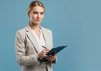 Professional woman holding clipboard and taking notes against blue background  