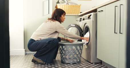 Woman, clothes and washing machine for cleaning in home with basket, fabric and routine for...