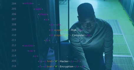 Kneeling IT technician inspecting server rack in data center, with cables and HTML tags, copy space
