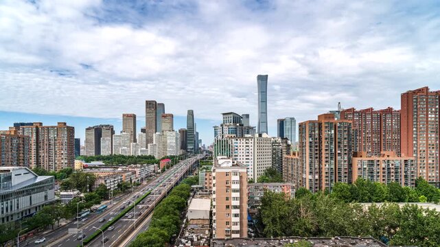 Traffic on elevated highways in Beijing&rsquo;s central district, with China Zun Tower and the Guomao area
