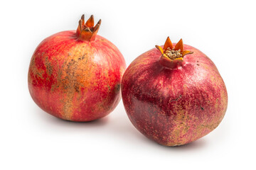 Fresh pomegranate fruit for Jewish holiday Rosh Hashanah on white background.
