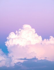 Majestic white cloud floats below a pastel sky, transitioning from blue to violet, creating an ethereal, dreamy atmosphere in vertical view