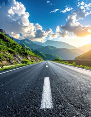 A long black asphalt road stretches towards distant green mountains, set against a bright blue sky with scattered puffy white clouds