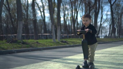A Child Happily Riding a Colorful Scooter in a Vibrant Park Setting Filled with Greenery