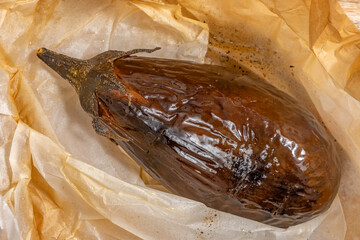 Baked eggplant on baking paper. 