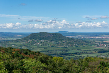 Naklejka premium green Landscape with volcano mountains in Hungary and blue sky
