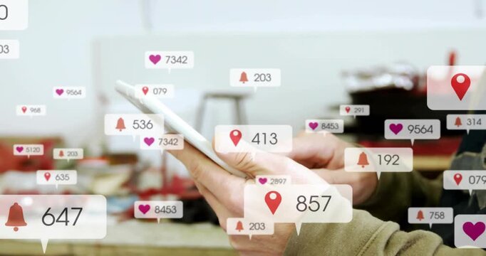 artisan tapping phone screen and displaying heart counts bell pins tracking tech notifications