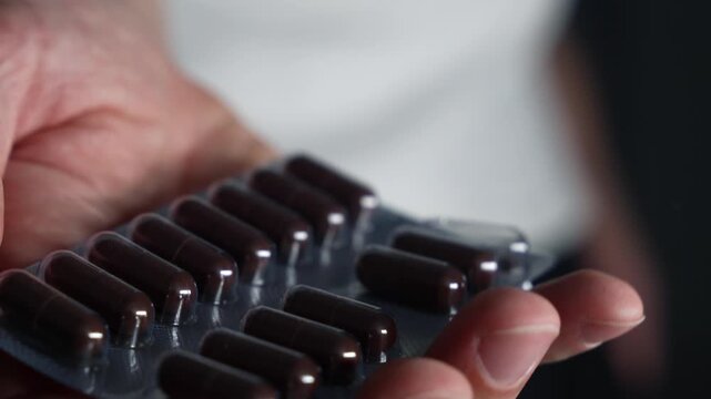 A man holds antidepressants prescribed by his doctor.
Medicines and health-improving medications.
Medicine capsules.
Vtamins in blitzer packaging.