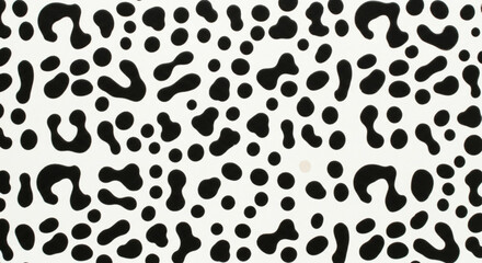 Playful black spots dance across a clean white surface, creating a modern, abstract pattern