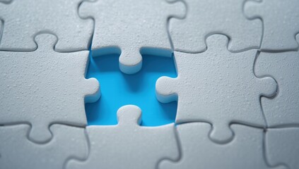 White puzzle pieces form a completed puzzle with one missing piece on a blue background. Ideal for problemsolving concepts.