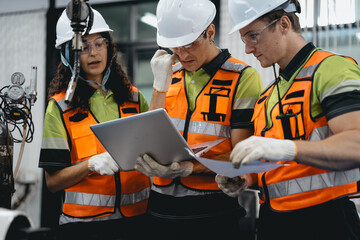 Obraz premium Diverse group of latin engineer working on AI technology in robotics electronics engineering laboratory. Hispanic technician team and colleague research in robot machine futuristic automated control.