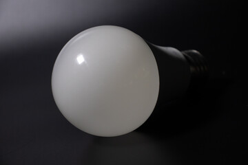 light bulb on black background