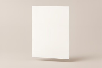 Fototapeta premium Blank white rectangle card or paper standing upright with soft shadow on a neutral background