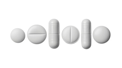 Assorted white pills and capsules for health and wellness concepts
