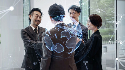 Group of business people shaking hands and global network image