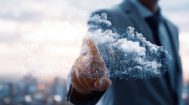 A man in a suit touches a digital cloud connected by lines. A blurry cityscape fades in the background with warm, bright lights - Powered by Adobe