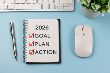 Notepad with text 2026 Goal, Plan, Action with checklist box New Year concept