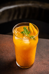 Orange lemonade with mint and ice