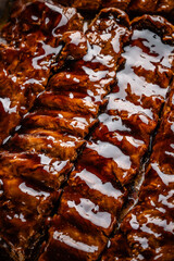 Glazed barbecue ribs with sauce.