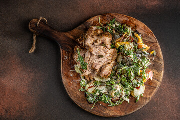 Pulled pork with fresh vegetable salad.