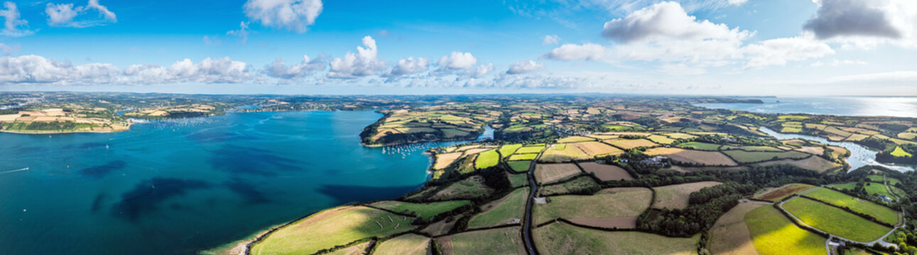 Farms and Fields over St Mawes from drone, Carrick Roads, River Fal, Falmouth, Cornwall, UK