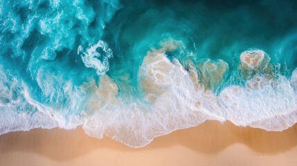 Overhead Beach Scene: Turquoise Ocean Surging onto Golden Sand