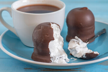 Israeli treats Krembo made of whipped cream, biscuit cookie and milk chocolate. 
