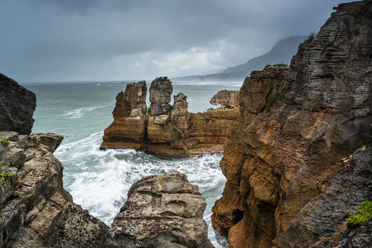Dramatic Rock Spires and Crashing Waves at Pancake Rocks, Punakaiki, Paparoa National Park, West Coast, New Zealand