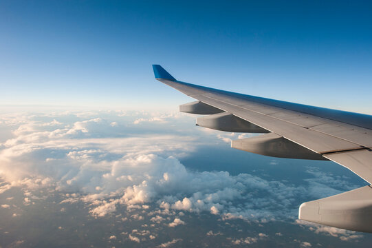 In-flight airliner wing seen through the window, Guadeloupe