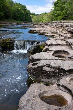 Flowing water of the River Ure at Aysgarth Falls In the Yorkshire Dales National Park.
